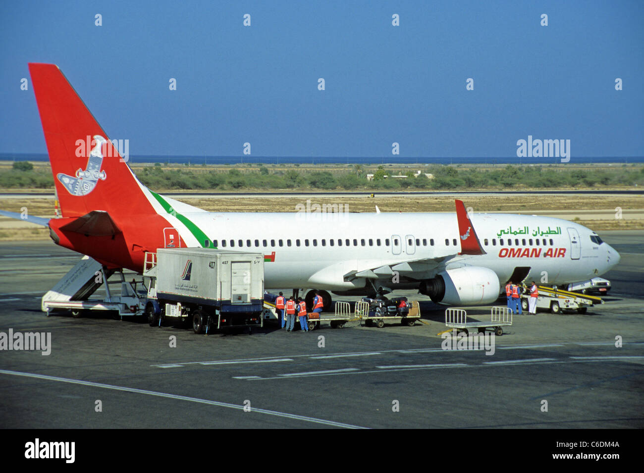 Oman Air in Parkposition am Fllughafen von Salalah,  Aircraft at the Airport Salalah, Oman air Stock Photo