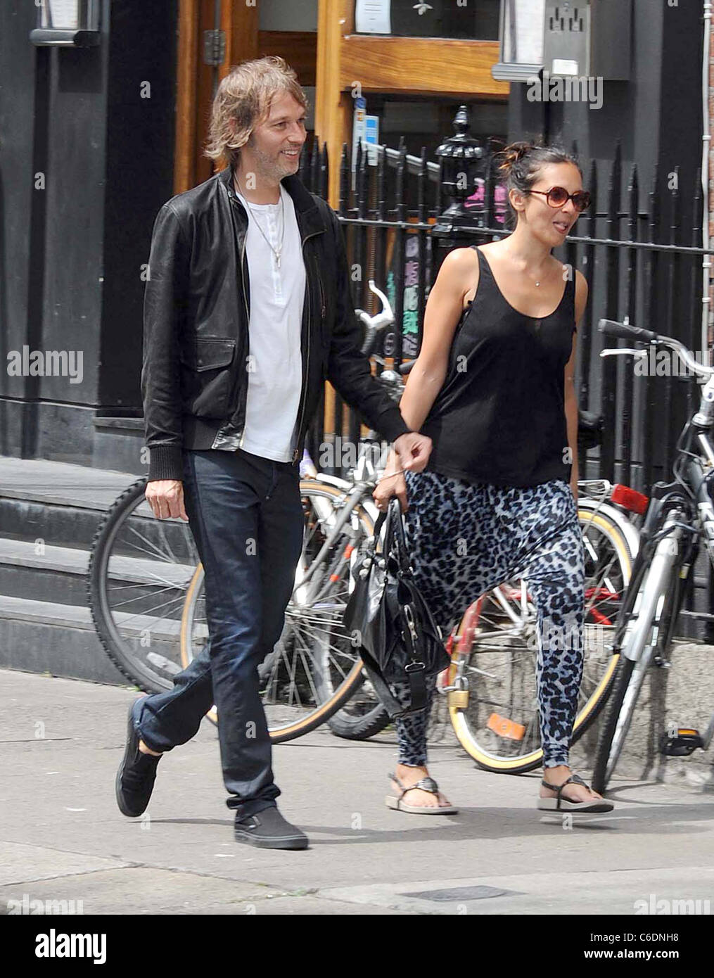 Andy Bell The Bassist For The Rock Band Oasis With His Wife Shiarra Juthan Out For A Stroll Dublin Ireland Andy Bell The Bassist For The Rock Band Oasis With His Wife Shiarra Juthan Out For A Stroll Dublin Ireland