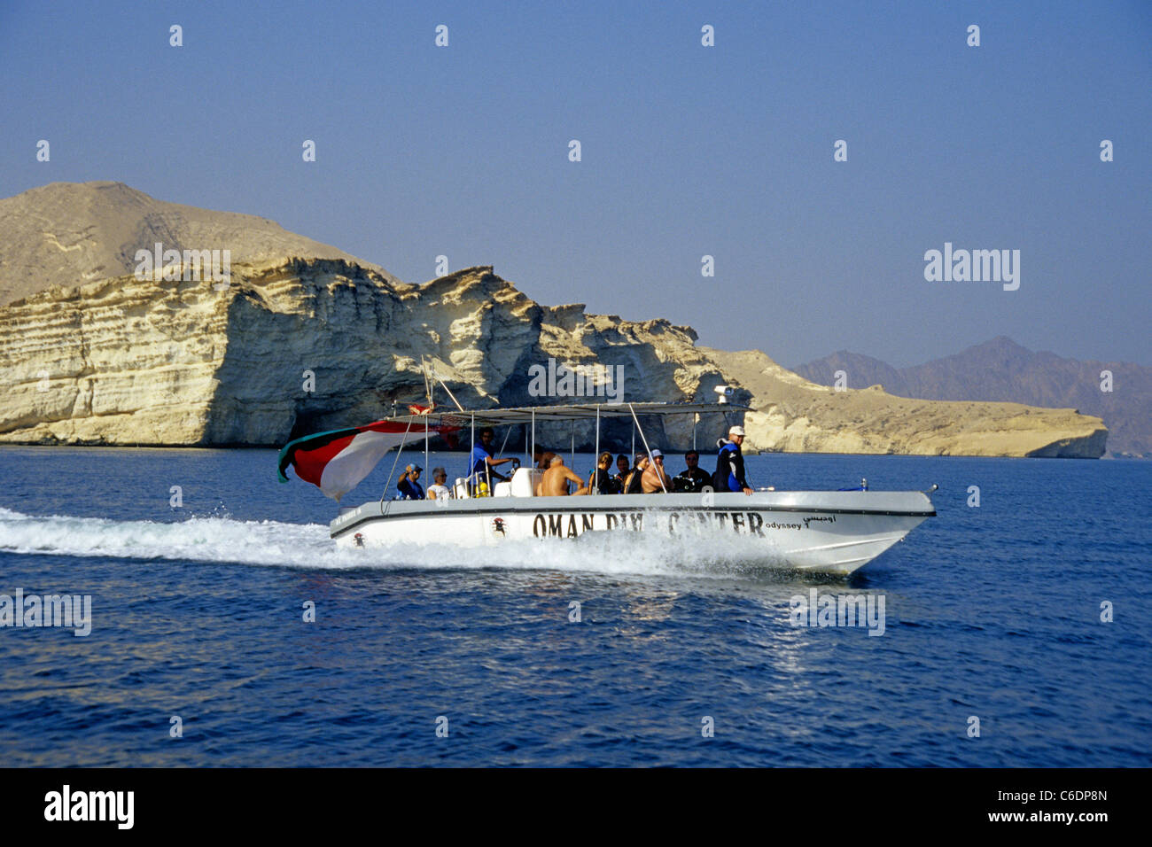 Tauchausfahrt, Tauchboot, Kuestenabschnitt, Bandar Jissah, Diving boat, people, Rocky Coastline of Bandar Jissah Stock Photo