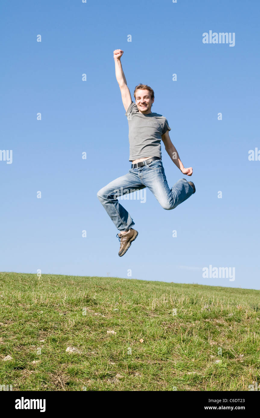 Man jumping for joy, Jena, Thuringia, Germany Stock Photo