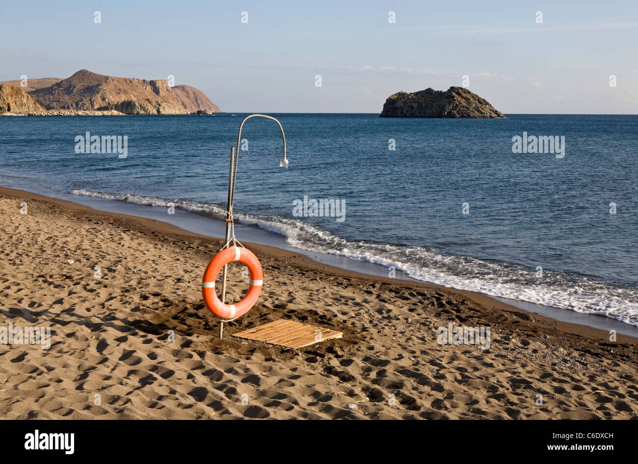 A beach shower with a life ring, Skala Eressou, Greece Stock Photo