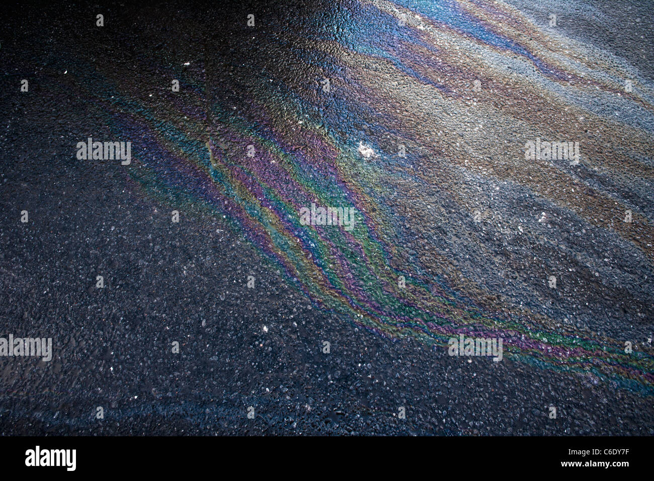 Oil Slick in a parking lot Stock Photo