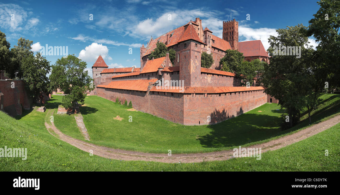 Panoramic view of the Teutonic Order’s castle in Malbork from its south corner. One row panorama with 145 gr. horizontal FOV. Stock Photo