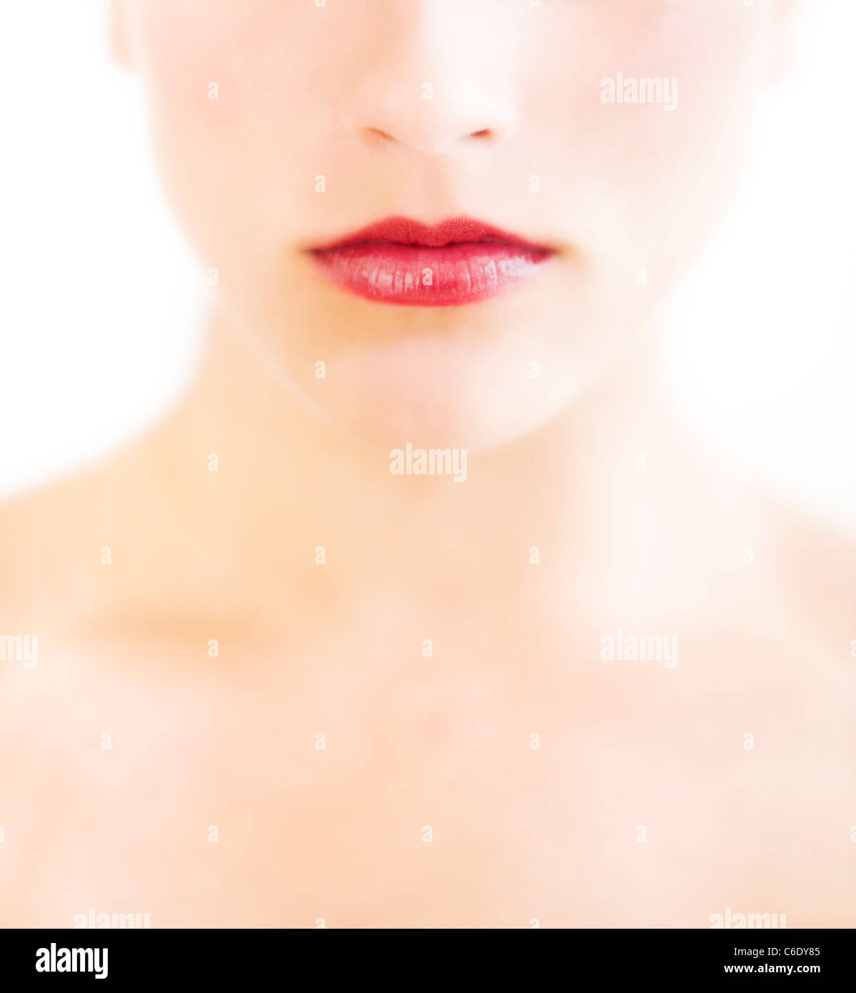 Young woman with red lips and pale complexion Stock Photo