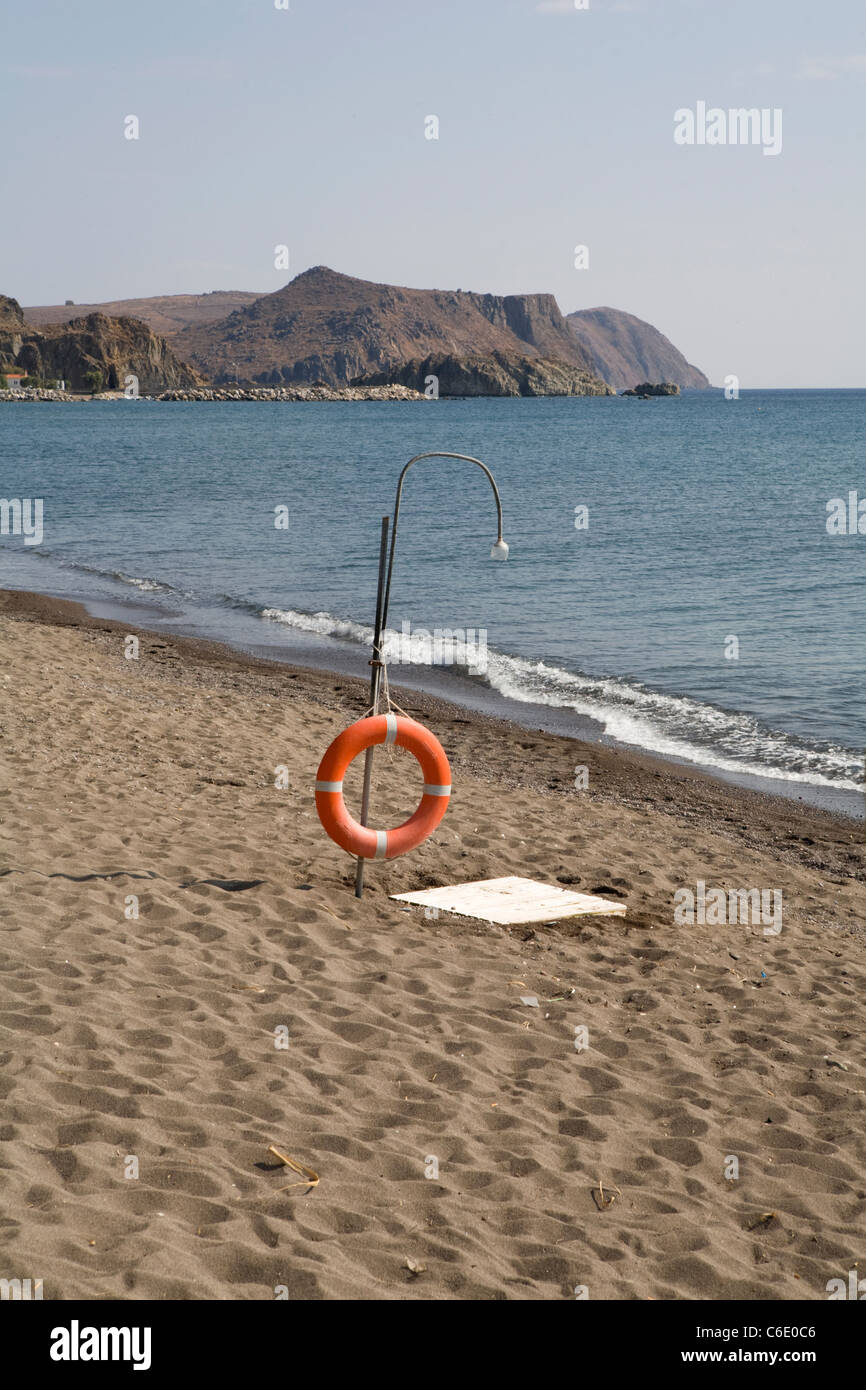 A beach shower with a life ring, Skala Eressou, Greece Stock Photo