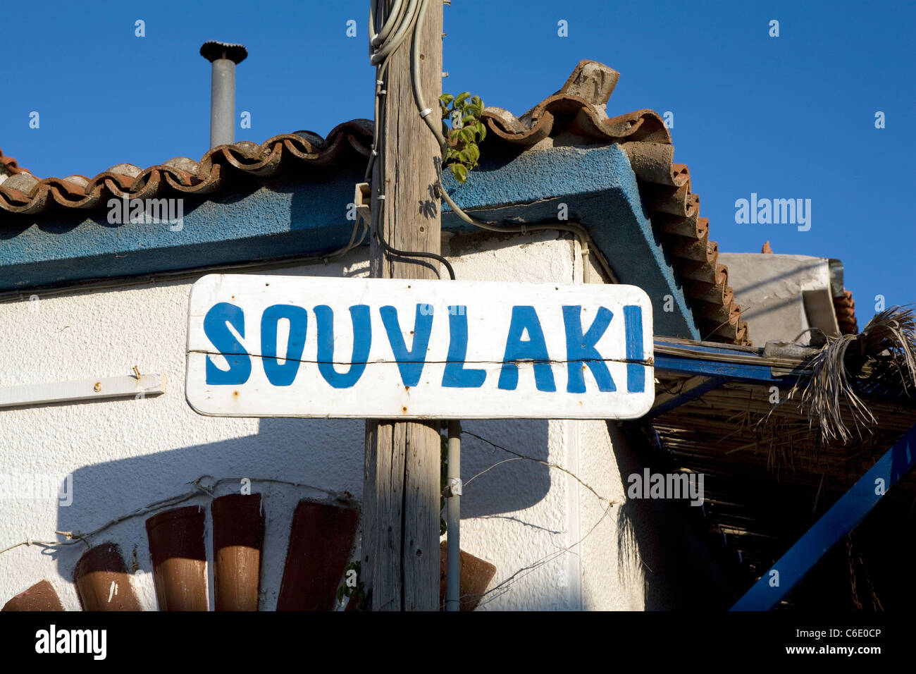 A sign on a restaurant, Skala Eressou, Greece Stock Photo