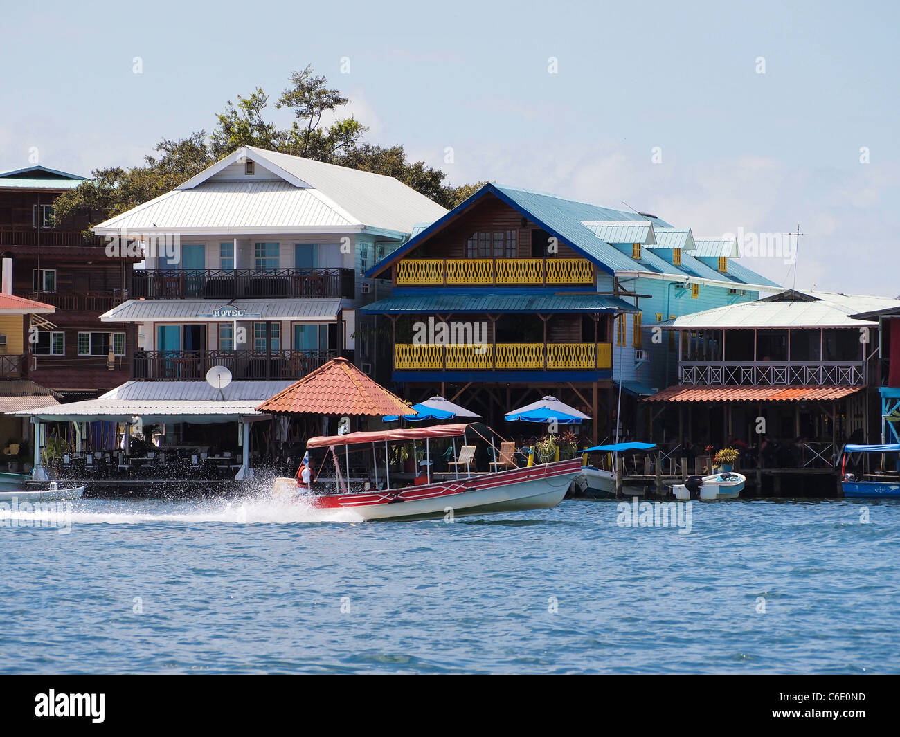 Waterfront hotels with boat in Bocas del Toro, Central America, Panama Stock Photo