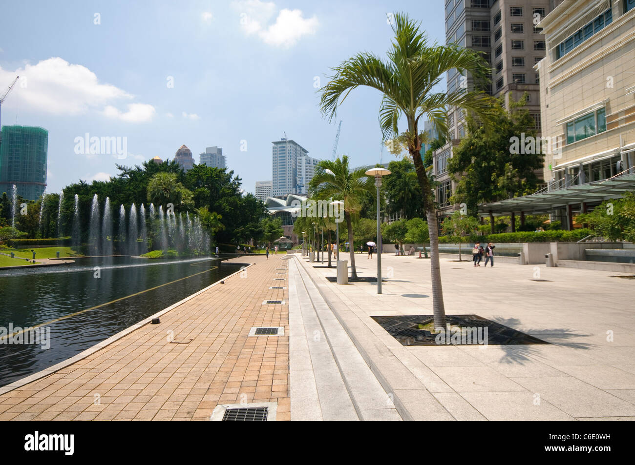 KLCC Park at the Petronas Twin Towers in front of the skyline with office buildings and hotels, Kuala Lumpur, Malaysia, Asia Stock Photo