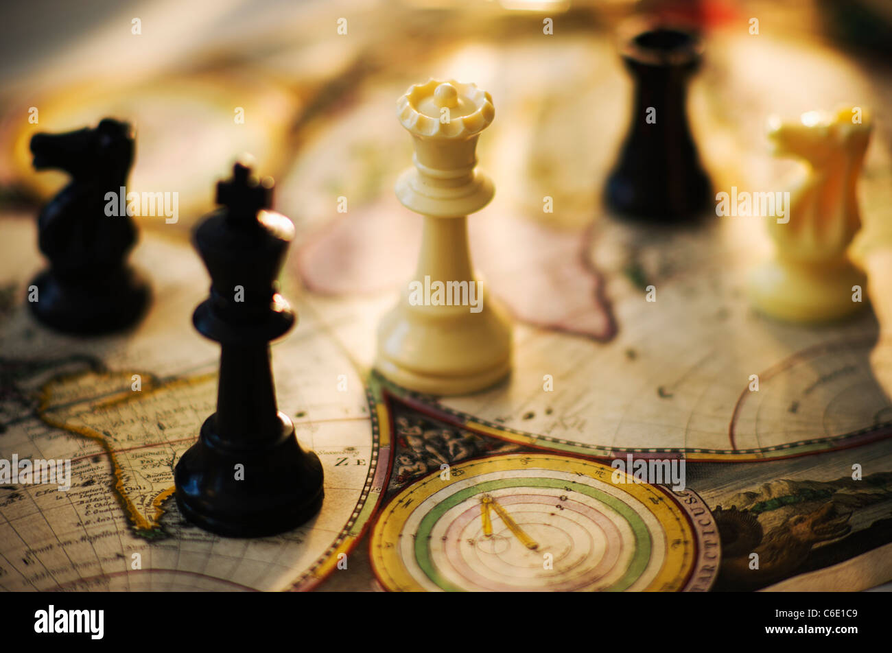 Chess, chess pieces, compass Stock Photo - Alamy