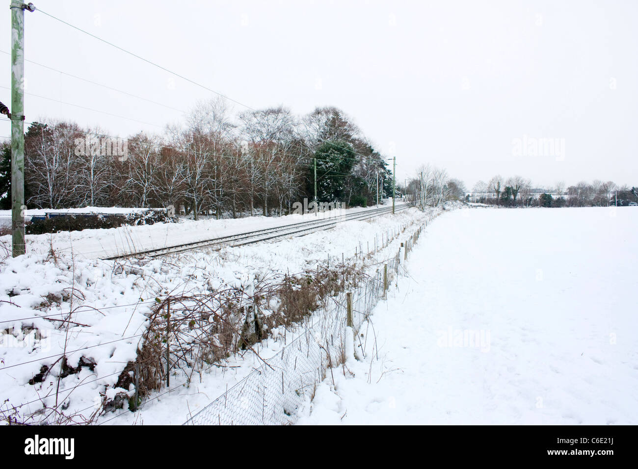 deserted railway train track in snow, england Stock Photo Alamy