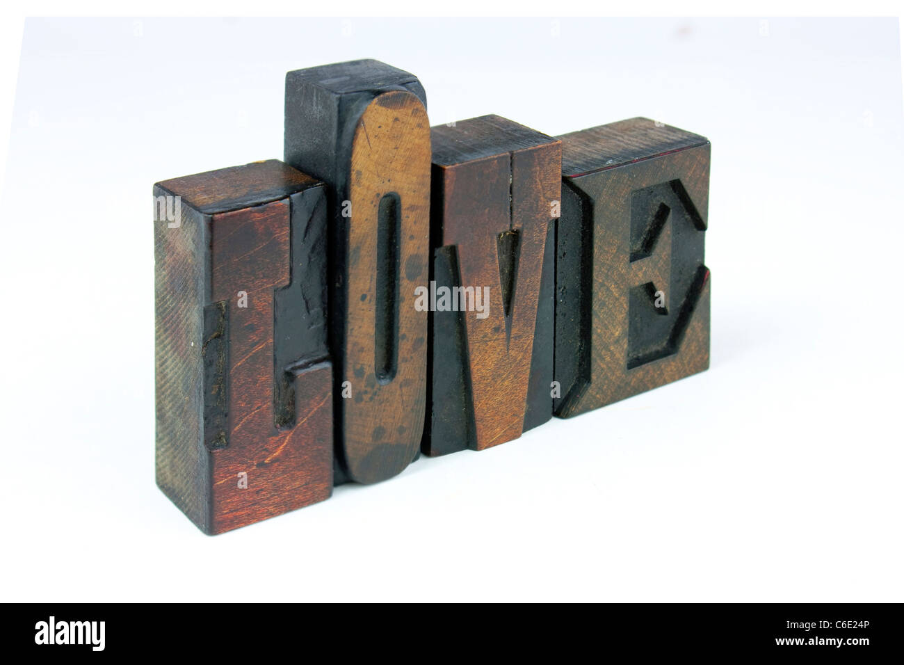 The word love in wooden letterpress printing block letters Stock Photo