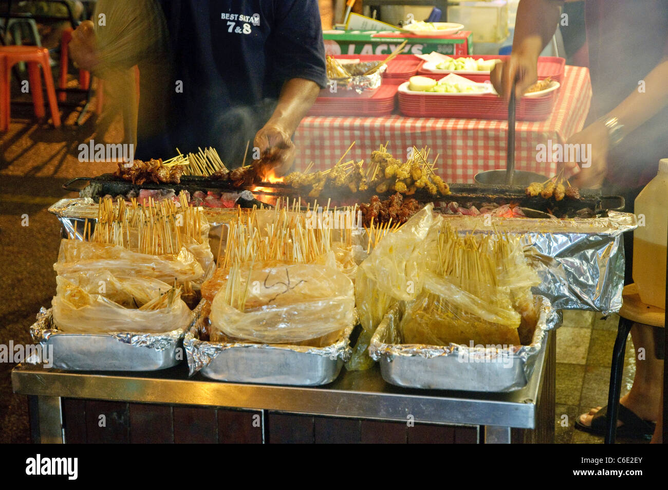 Barbecue grills, open air restaurants at night, Lau Pa Sat, Old Market, food center in the business district, Singapore Stock Photo