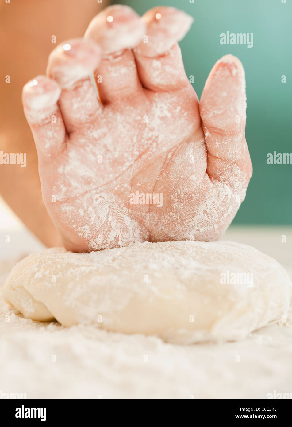 USA, New Jersey, Jersey City, Close up of woman's hand preparing dough Stock Photo