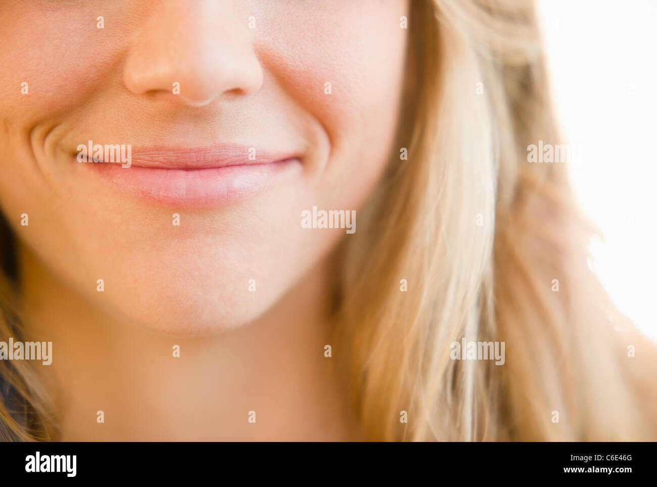 USA, New Jersey, Jersey City, Close up of mouth of smirking woman Stock  Photo - Alamy