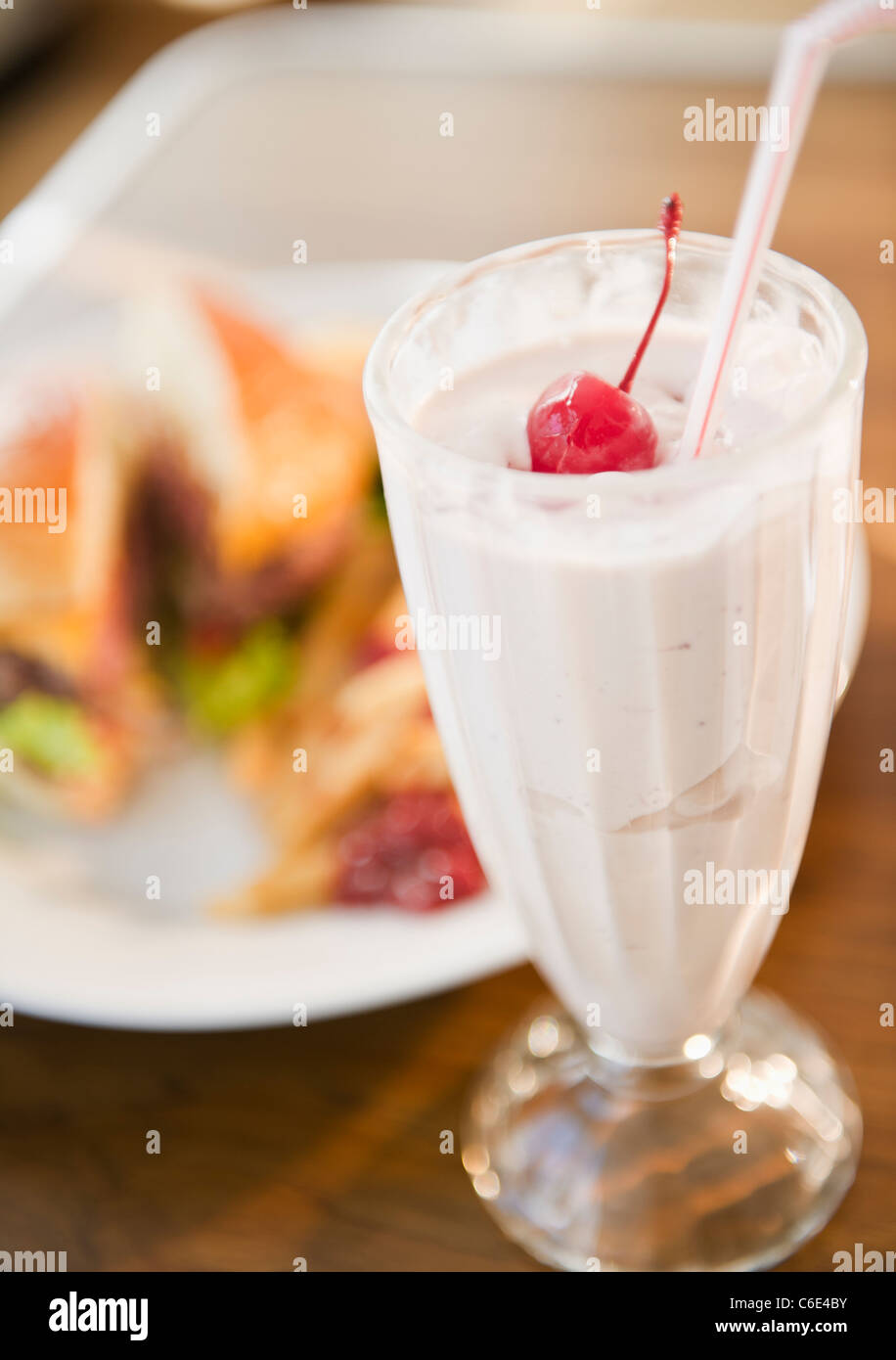 USA, New Jersey, Jersey City, Close up of meal and milkshake Stock Photo