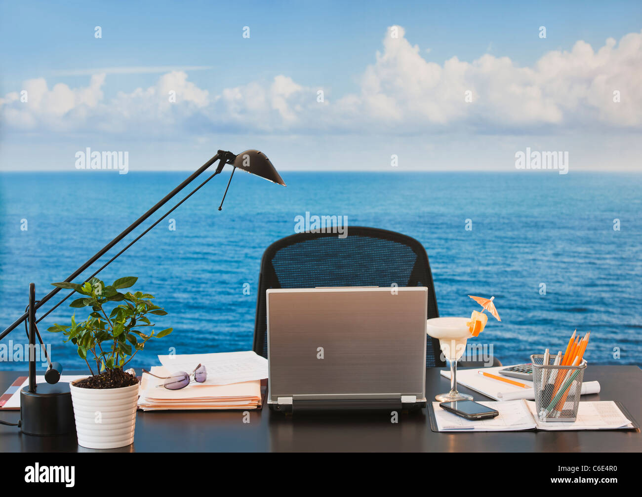 Close up of office desk with sea and sky in backgrounds Stock ...
