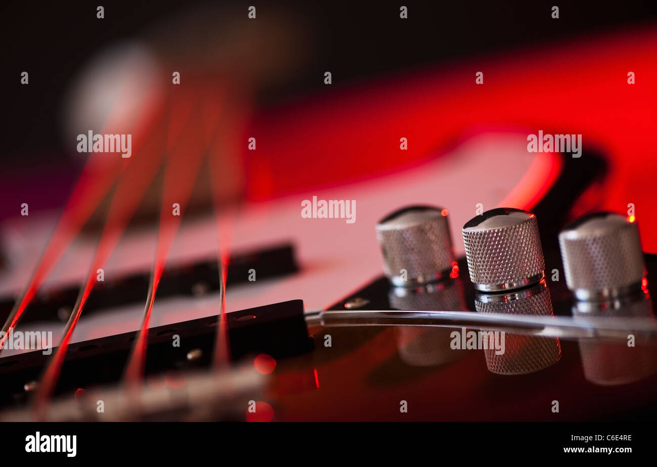 Close up of volume knobs of bass guitar Stock Photo