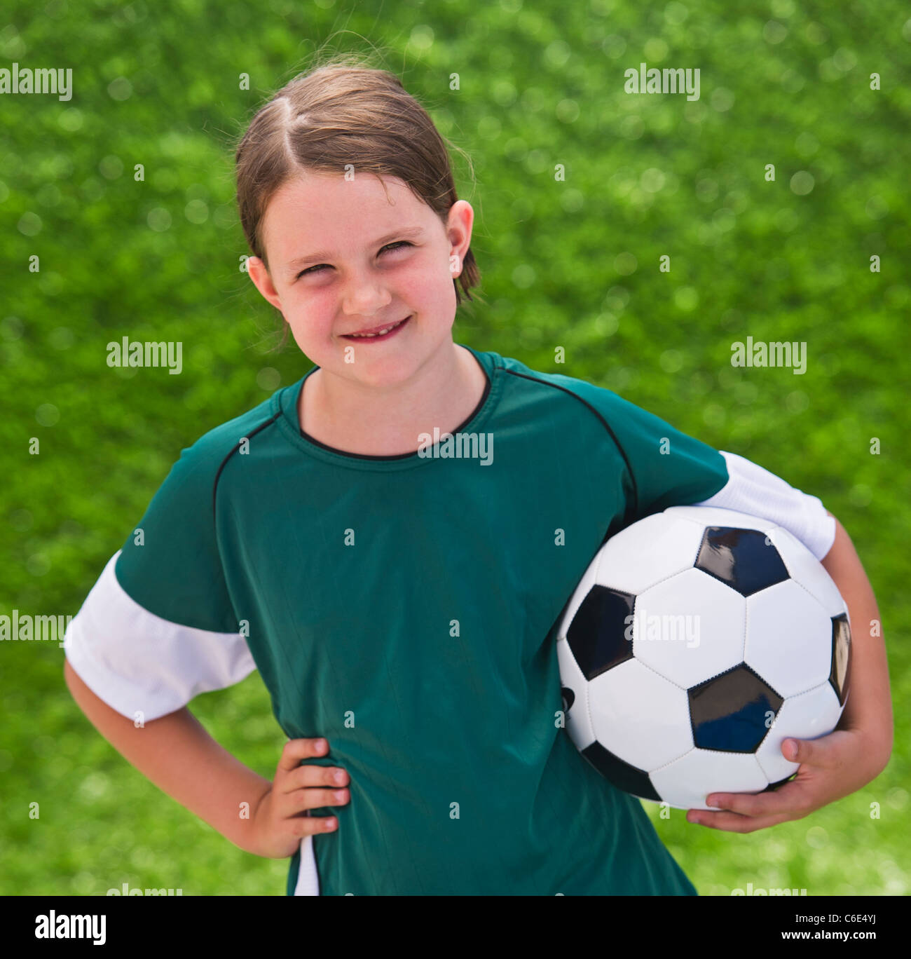 USA, New Jersey, Jersey City, Portrait of girl with soccer ball Stock