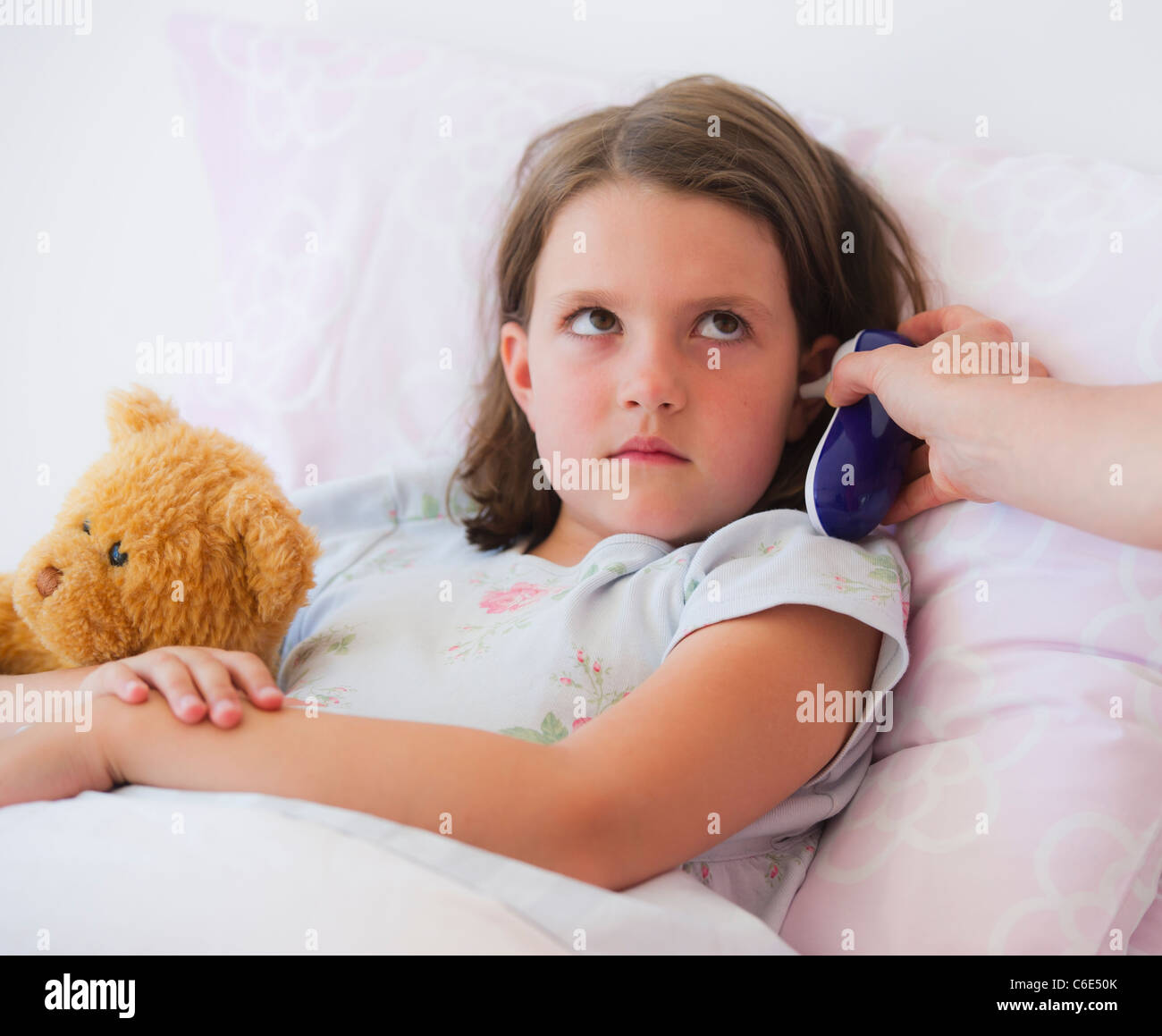 USA, New Jersey, Jersey City, Close up of sick girl lying in bed Stock