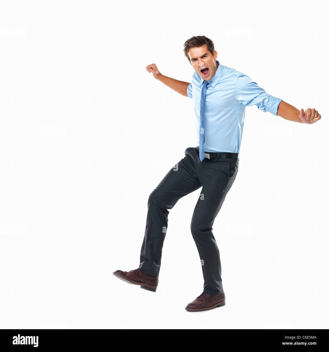 Excited young man raising arms hi-res stock photography and images - Alamy