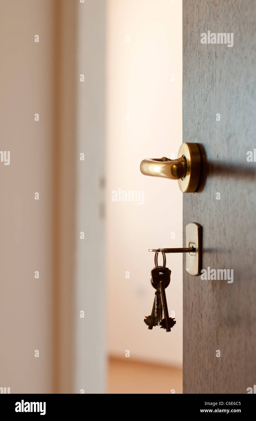 Open door with keys. Real estate Stock Photo Alamy