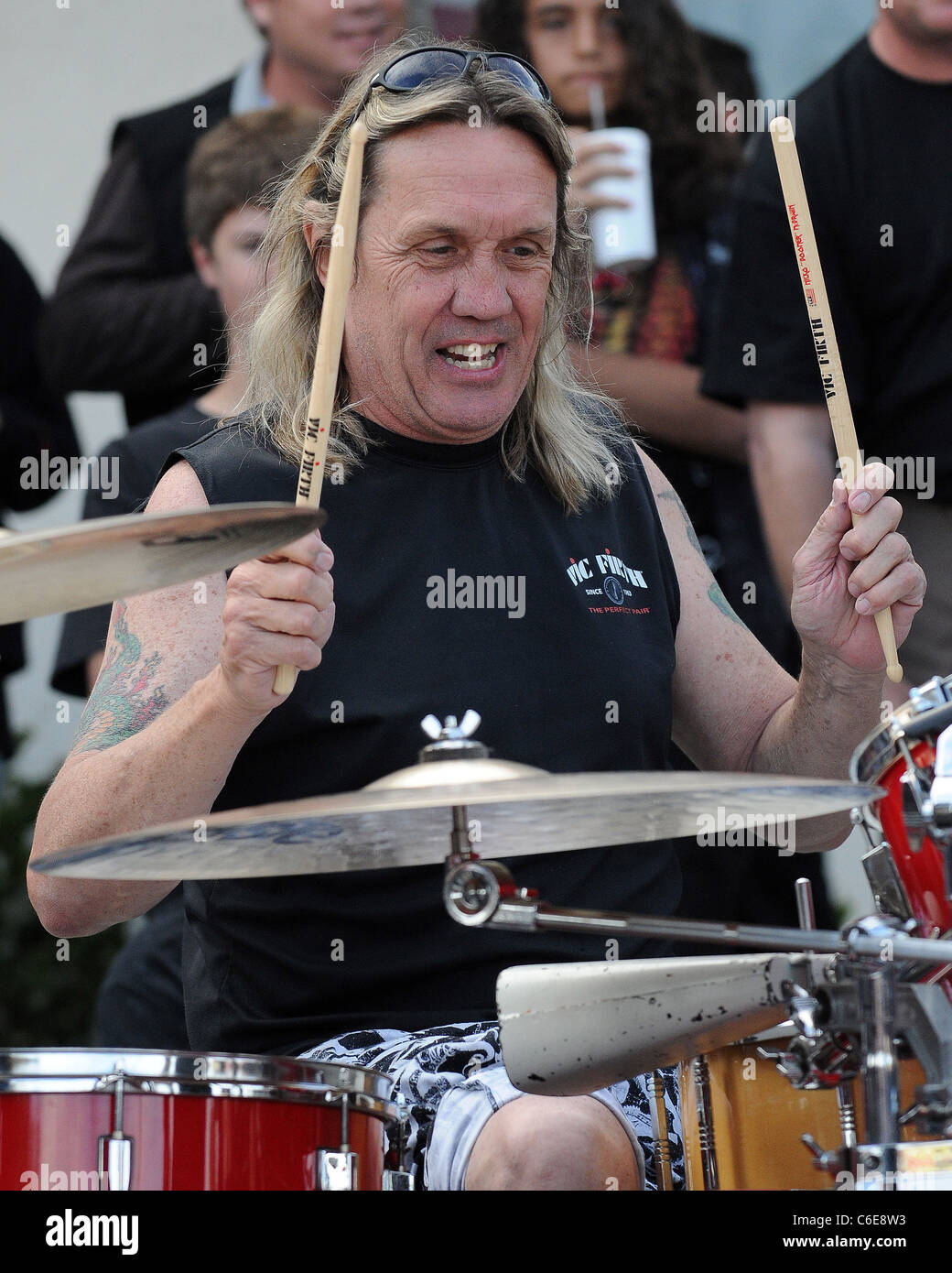 Iron Maiden drummer Nicko McBrain celebrates the grand opening of his  restaurant 'Rock and Roll Ribs' in Coral Springs, Florida Stock Photo -  Alamy