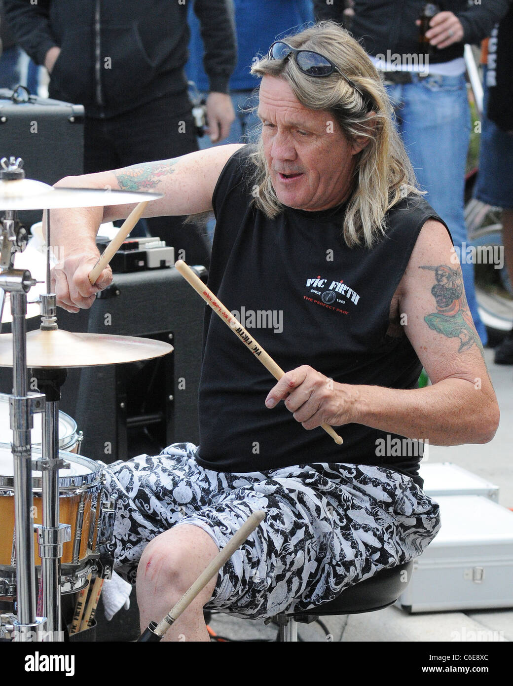 Iron Maiden drummer Nicko McBrain celebrates the grand opening of his