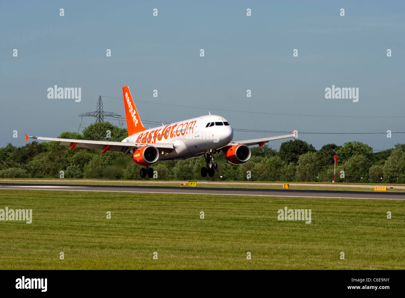 EasyJet aircraft landing at Manchester Airport Stock Photo - Alamy