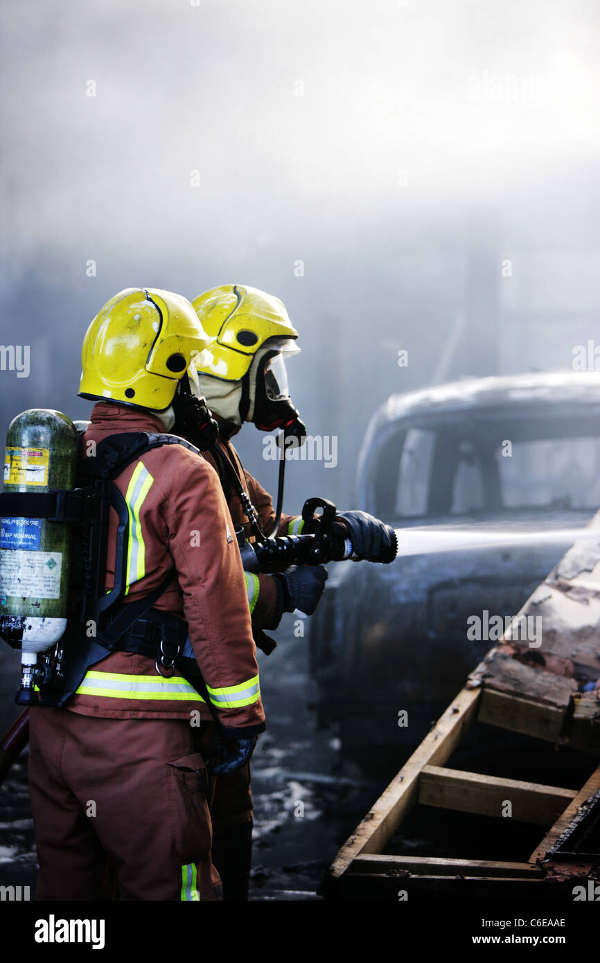 Coventry Fire Fighters at a car fire in Coventry West Midlands