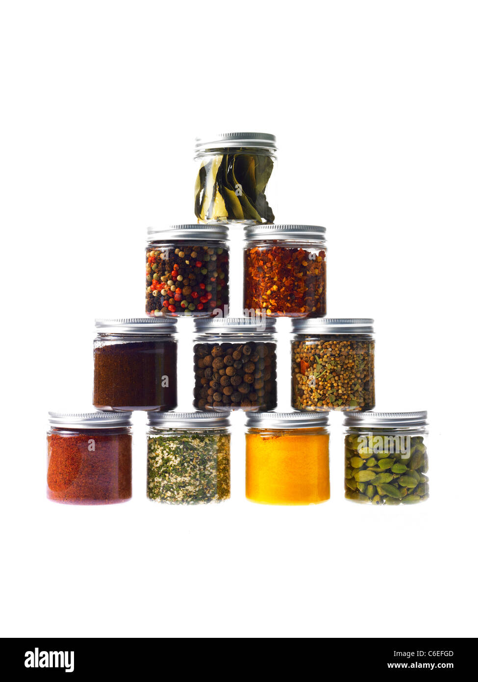 Studio shot of jars with spices Stock Photo