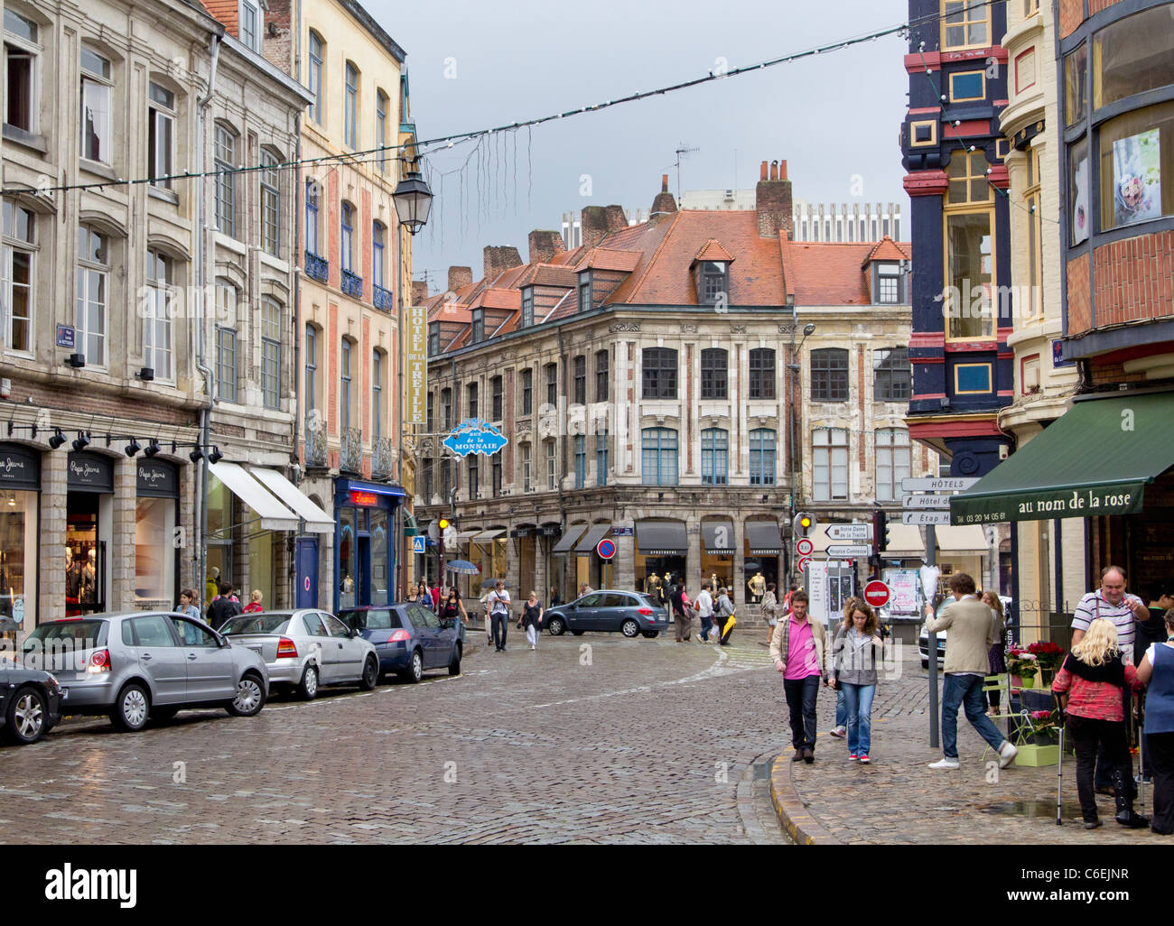A rainy day in the streets of Lille. Place du Lion d'Or, Old Lille. Nord-Pas de Calais, France Stock Photo