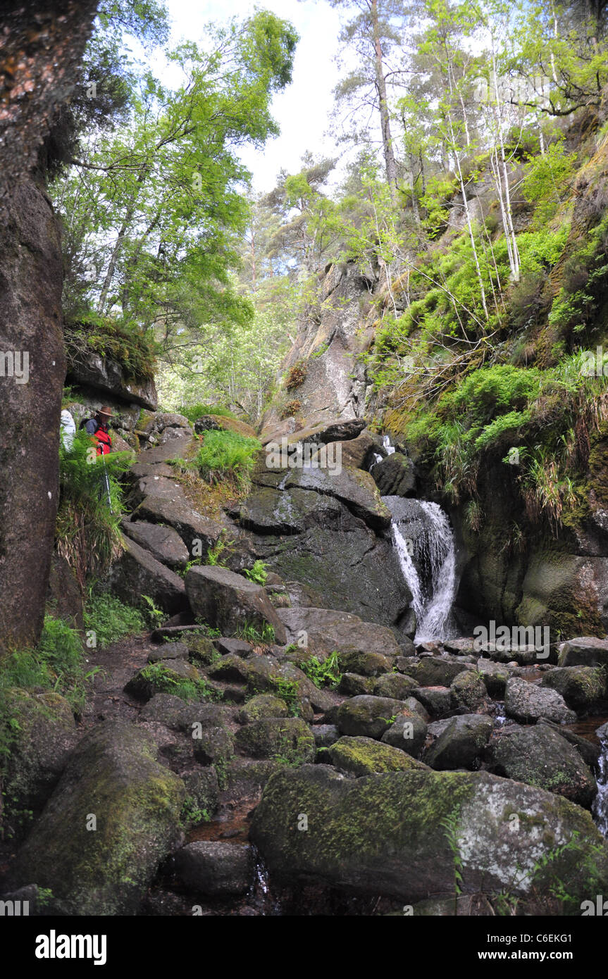 Waterfall inside the Burn O'Vat, near Dinnet, Aboyne, Aberdeenshire, UK Stock Photo