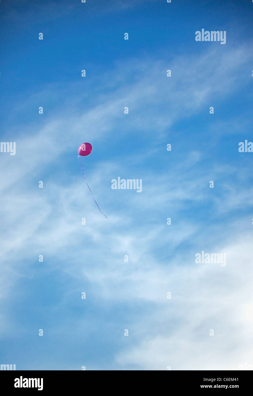 Balloon floating in sky Stock Photo