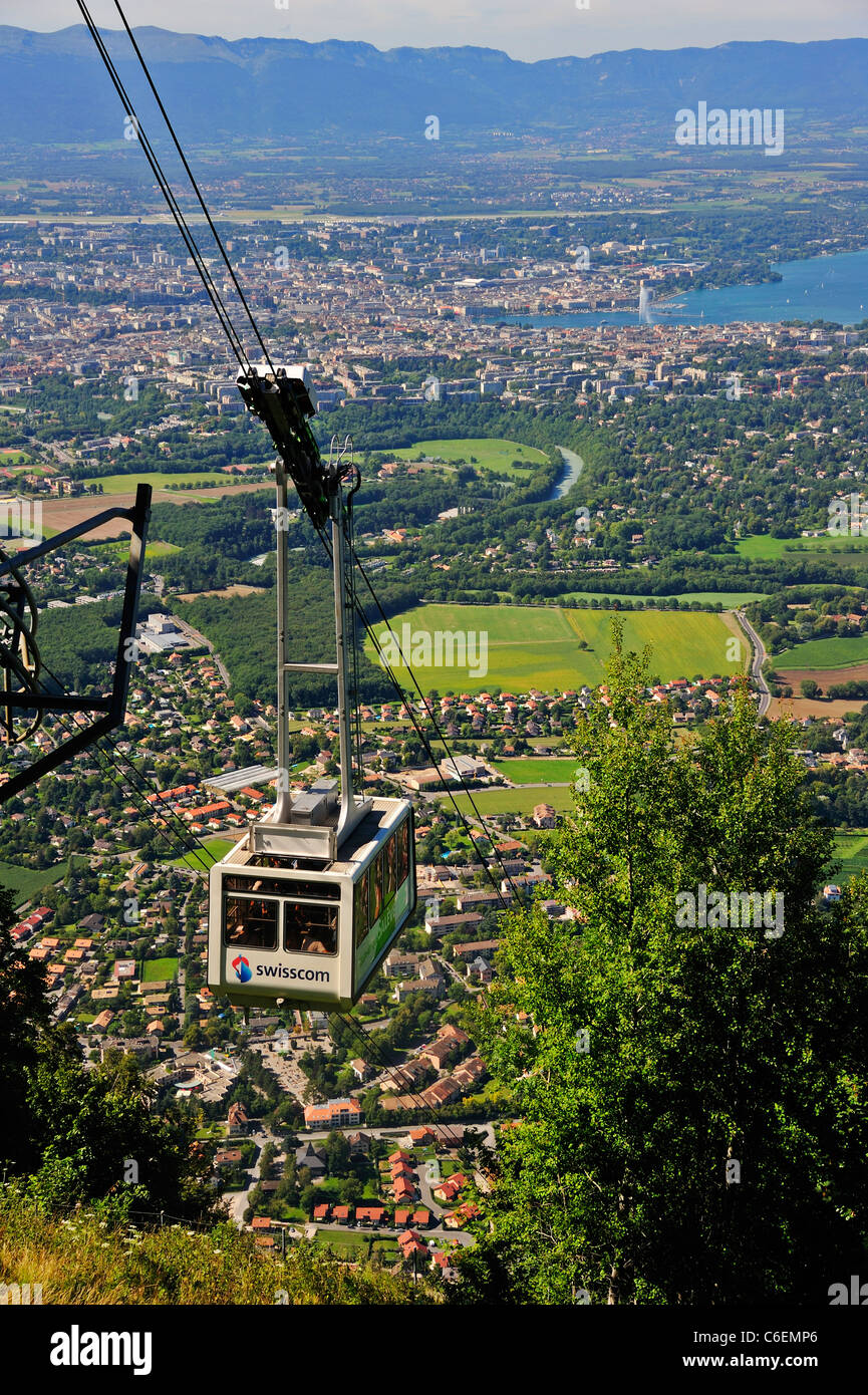The Saleve cable car, France, with the city of Geneva in the background.  The famous Jet d'Eau upper right Stock Photo - Alamy