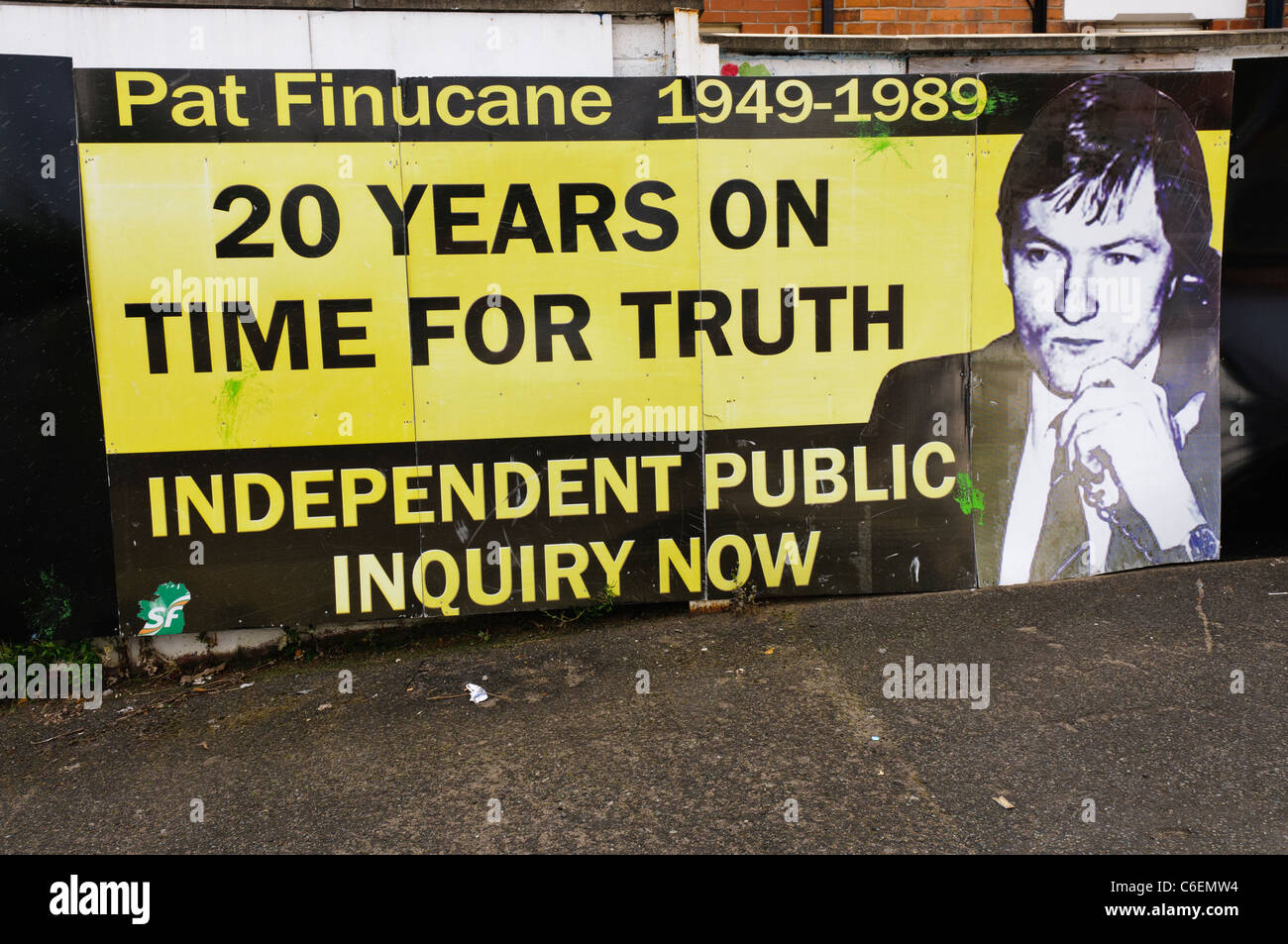 Mural calling for a public inquiry for Pat Finucane, a Belfast solicitor who was murdered by loyalists in 1989. Stock Photo
