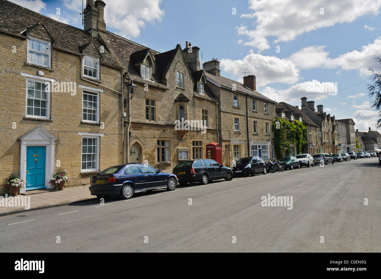 Houses on the main street in the Gloucestershire village of Fairford Stock Photo
