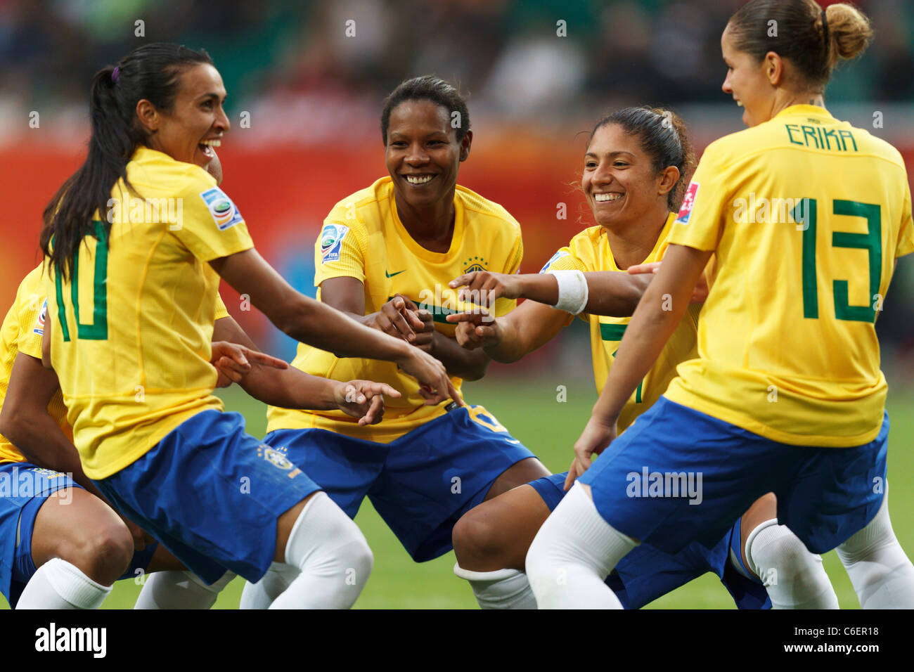 Marta of Brazil (10) celebrates with teammates after scoring a goal in a 2011 Women's World Cup Group D match against Norway. Stock Photo