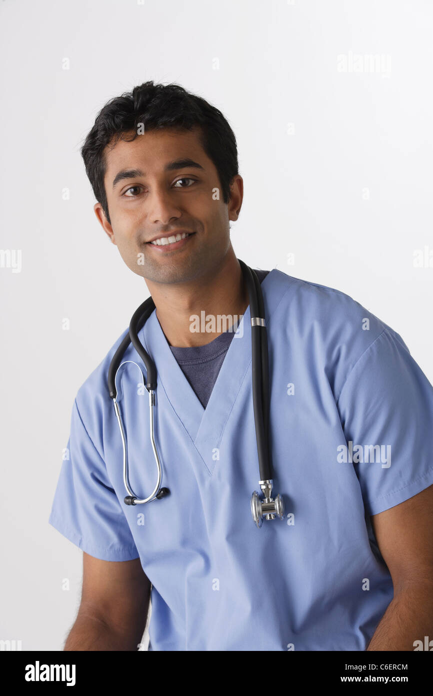 Portrait of young male nurse, studio shot Stock Photo
