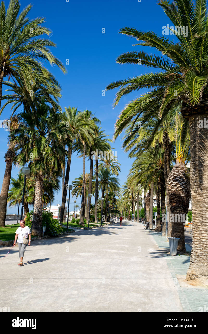 Seafront promenade in Sitges near Barcelona, Spain Stock Photo
