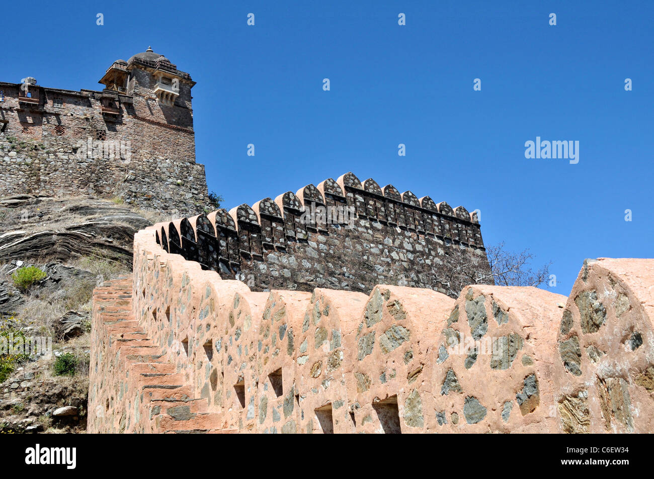 Old stone steps and ramparts leading to Badal Mahal Palace Kumbhalgarh Fort Rajsamand District Rajasthan India Stock Photo
