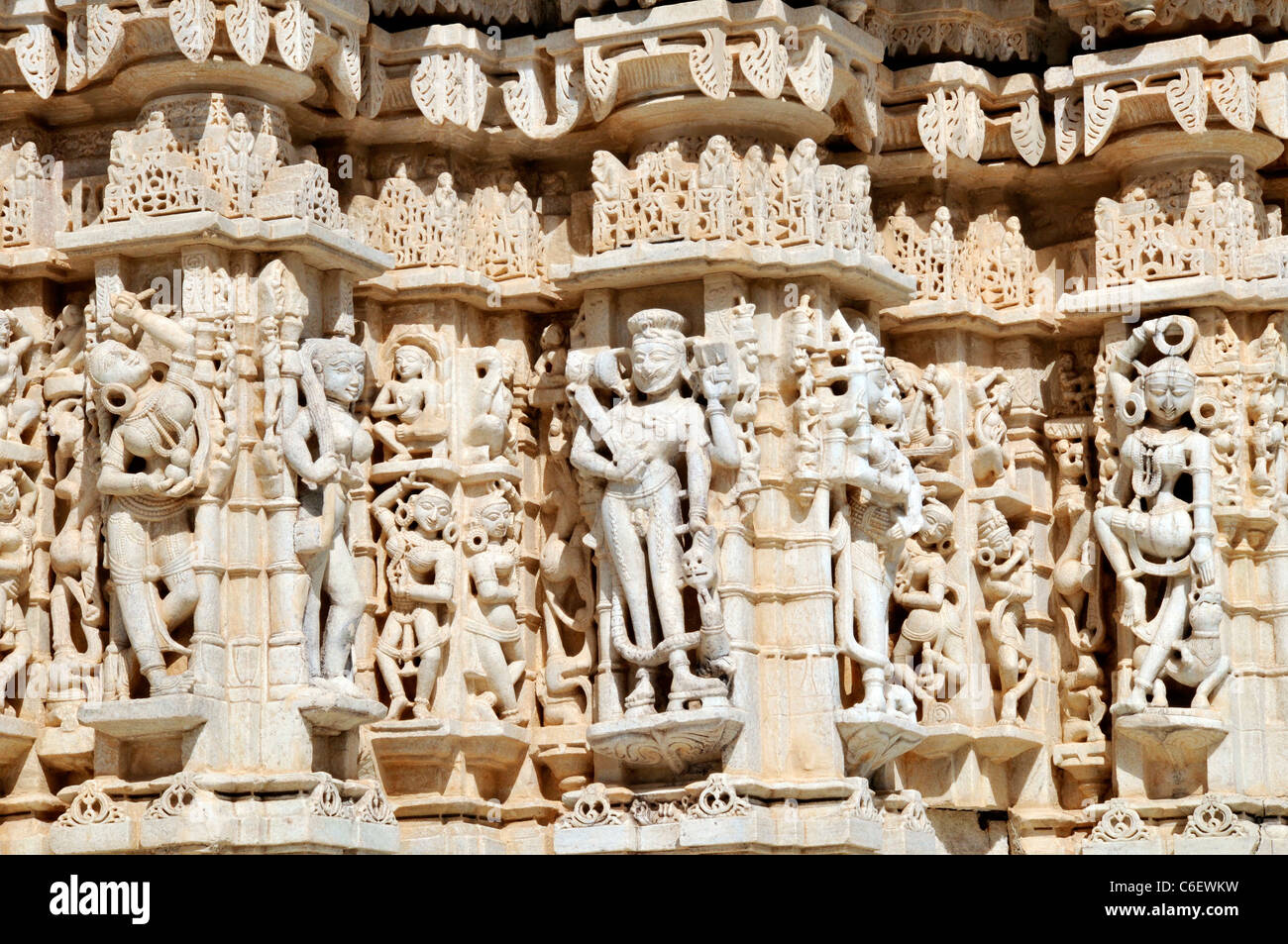 Inticate carved stone frieze Neminath Jain Temple Ranakpur Rajasthan India Stock Photo