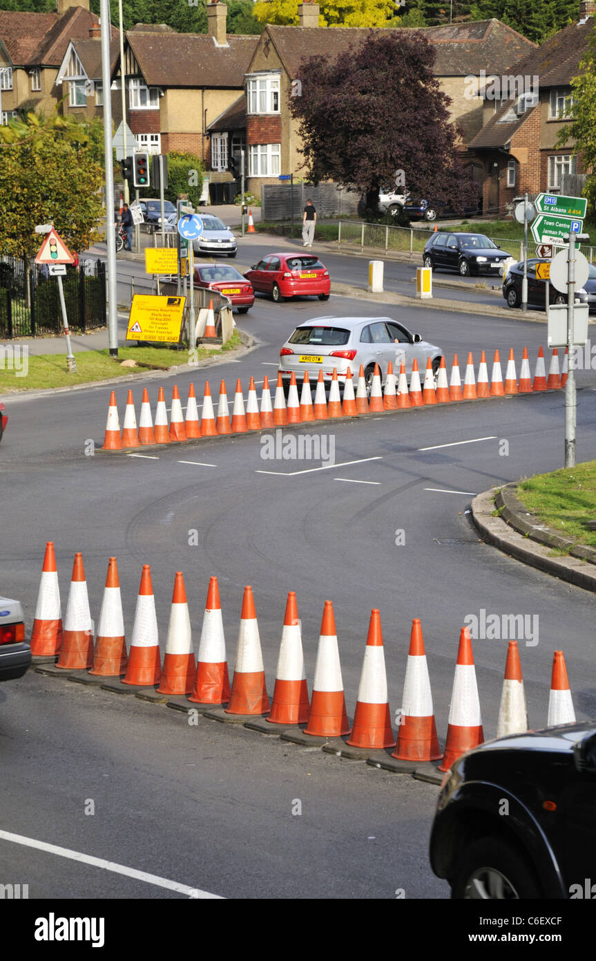 Summer resurfacing roadworks at the Hemel Hempstead magic roundabout, UK. Stock Photo