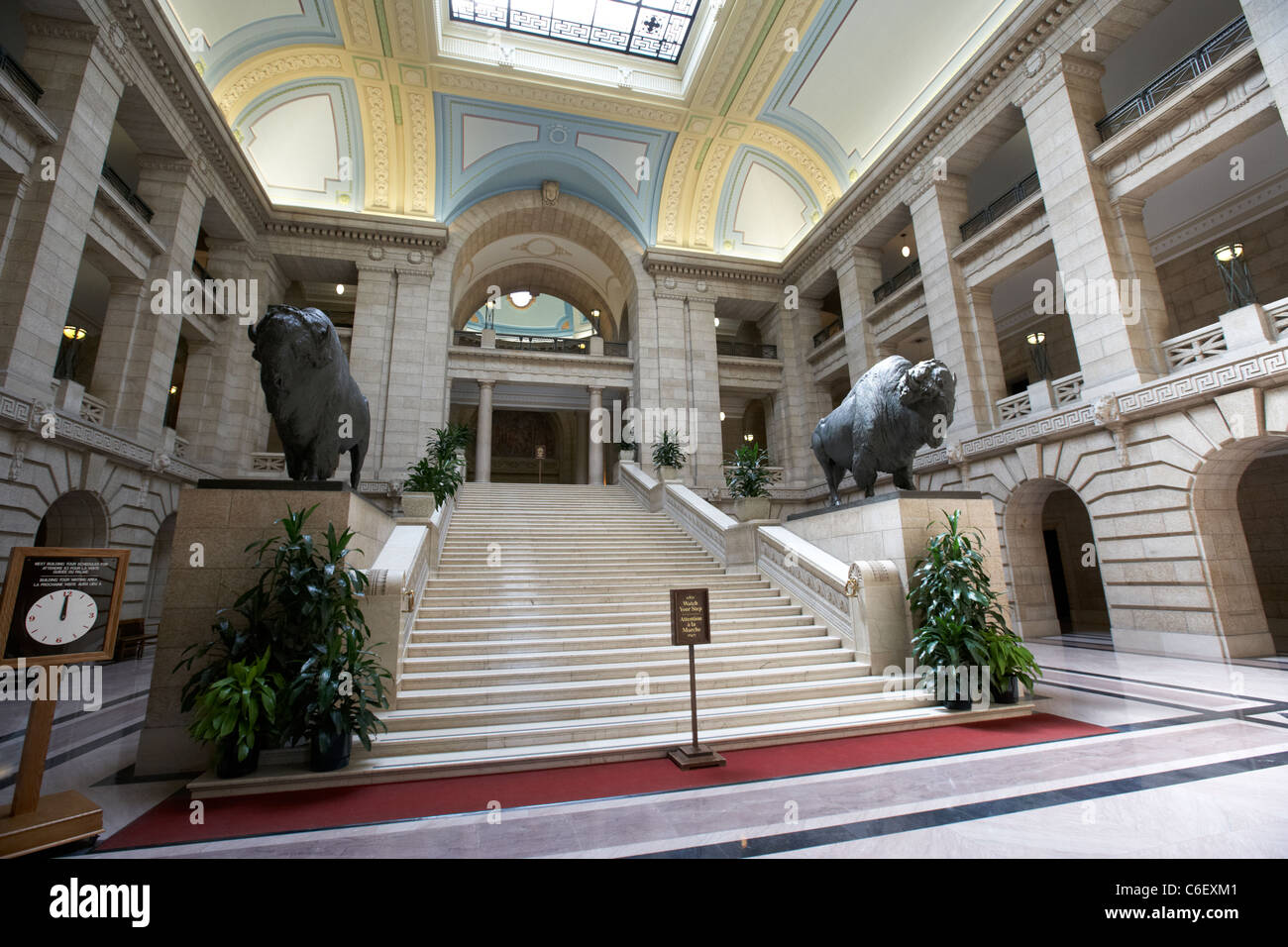 interior of manitoba legislative building with grand staircase and huge bronze bison winnipeg manitoba canada Stock Photo