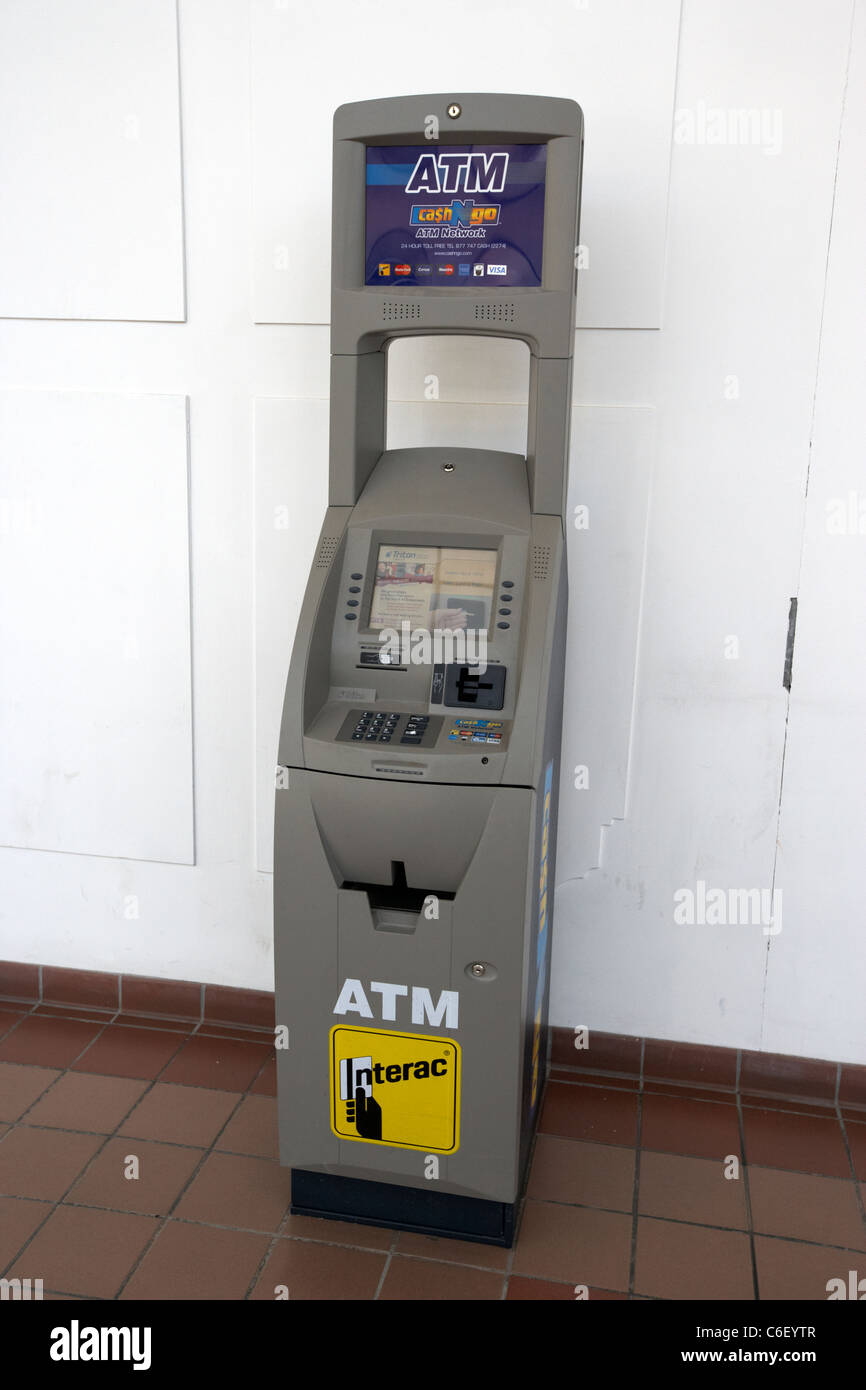 private small atm abm cash dispensing machine indoors in winnipeg manitoba canada Stock Photo