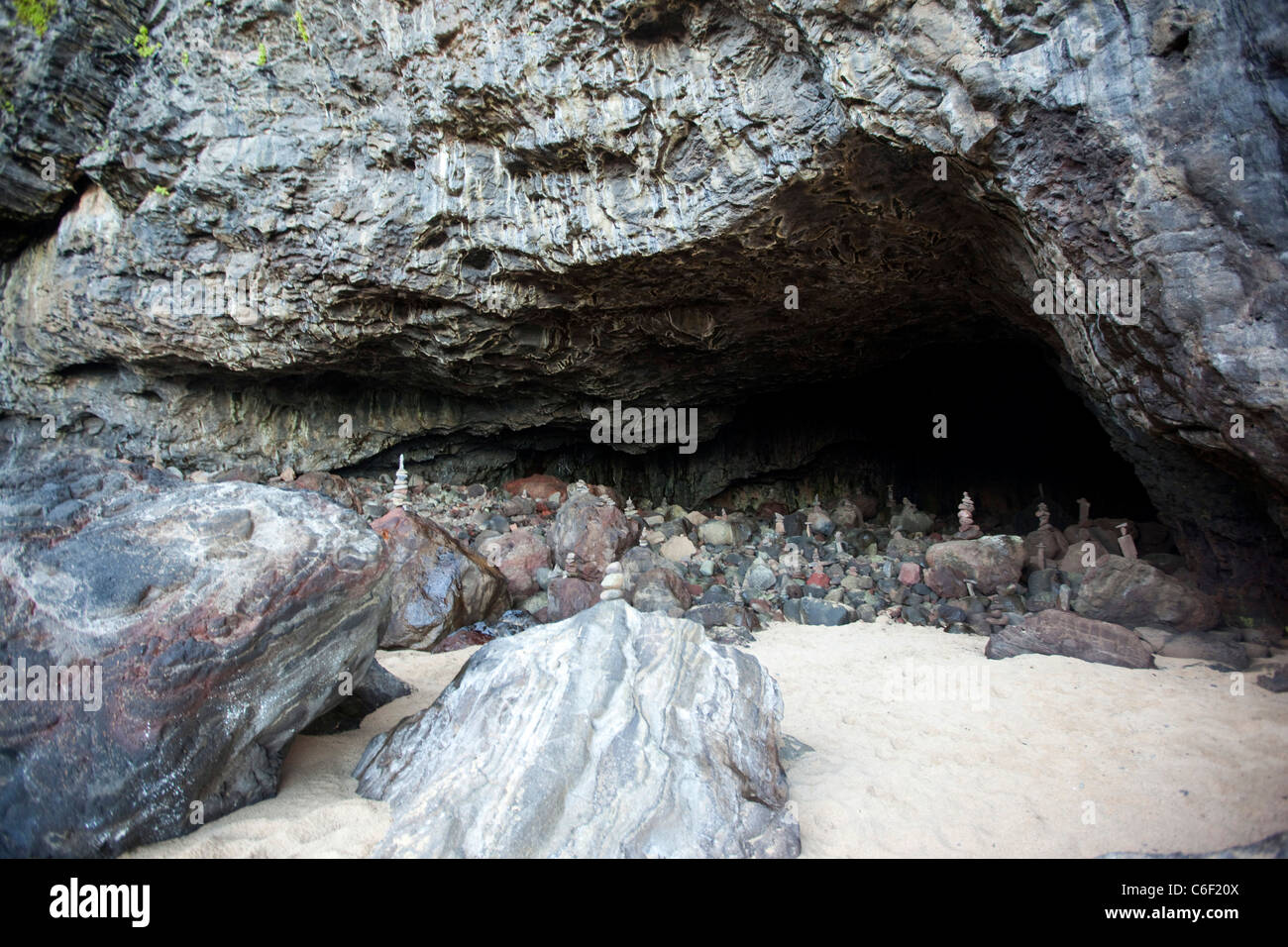 Rock stacking, Cave, Kalalau Beach,Napali Coast, Kauai, Hawaii Stock