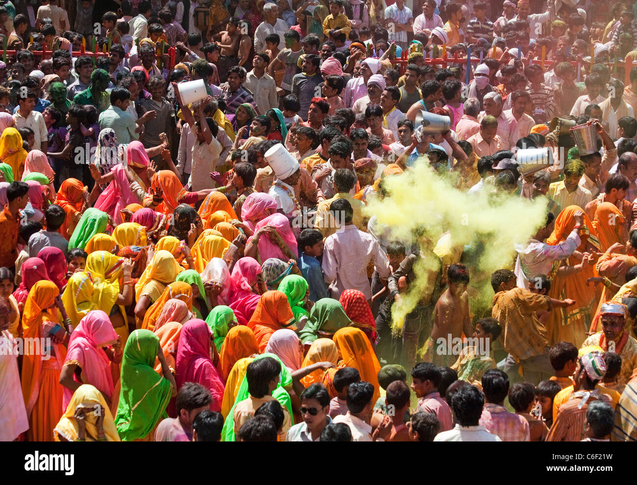 Hindu people celebrate Holi festival in Mathura, India Stock Photo