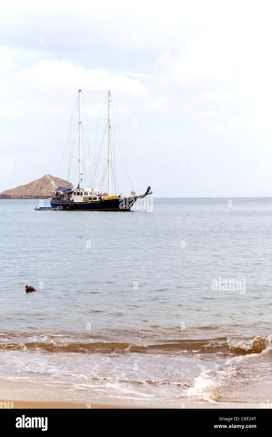 Yacht moored off Punta Pitt, San Christobel, Galapagos Stock Photo