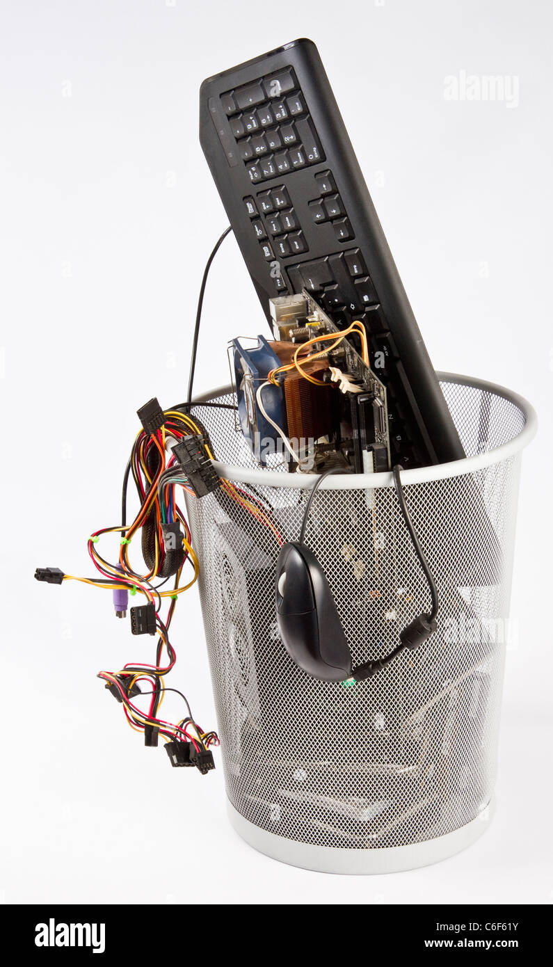 electronic waste in wast basket Stock Photo