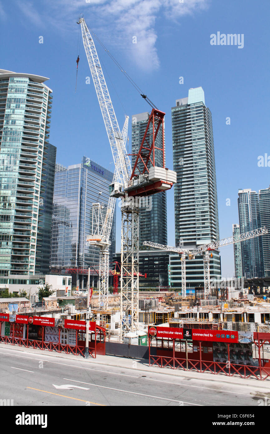 building construction site busy city downtown Stock Photo
