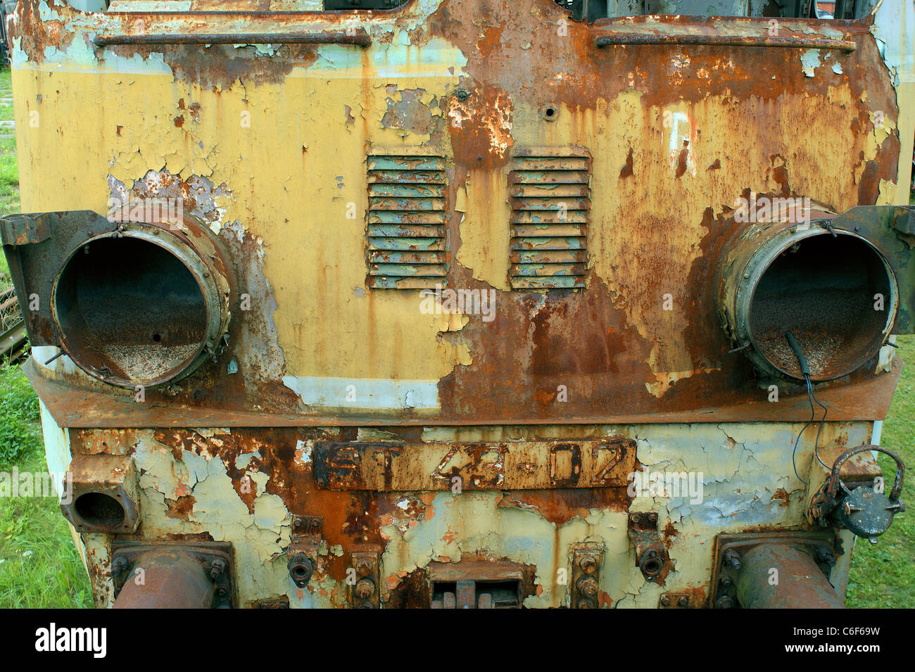 Abandoned old locomotive robbed blind blinded harmed wronged forsaken forgotten outcast Stock Photo